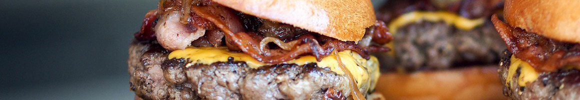 Eating Burger at Blake's Lotaburger restaurant in Tucumcari, NM.